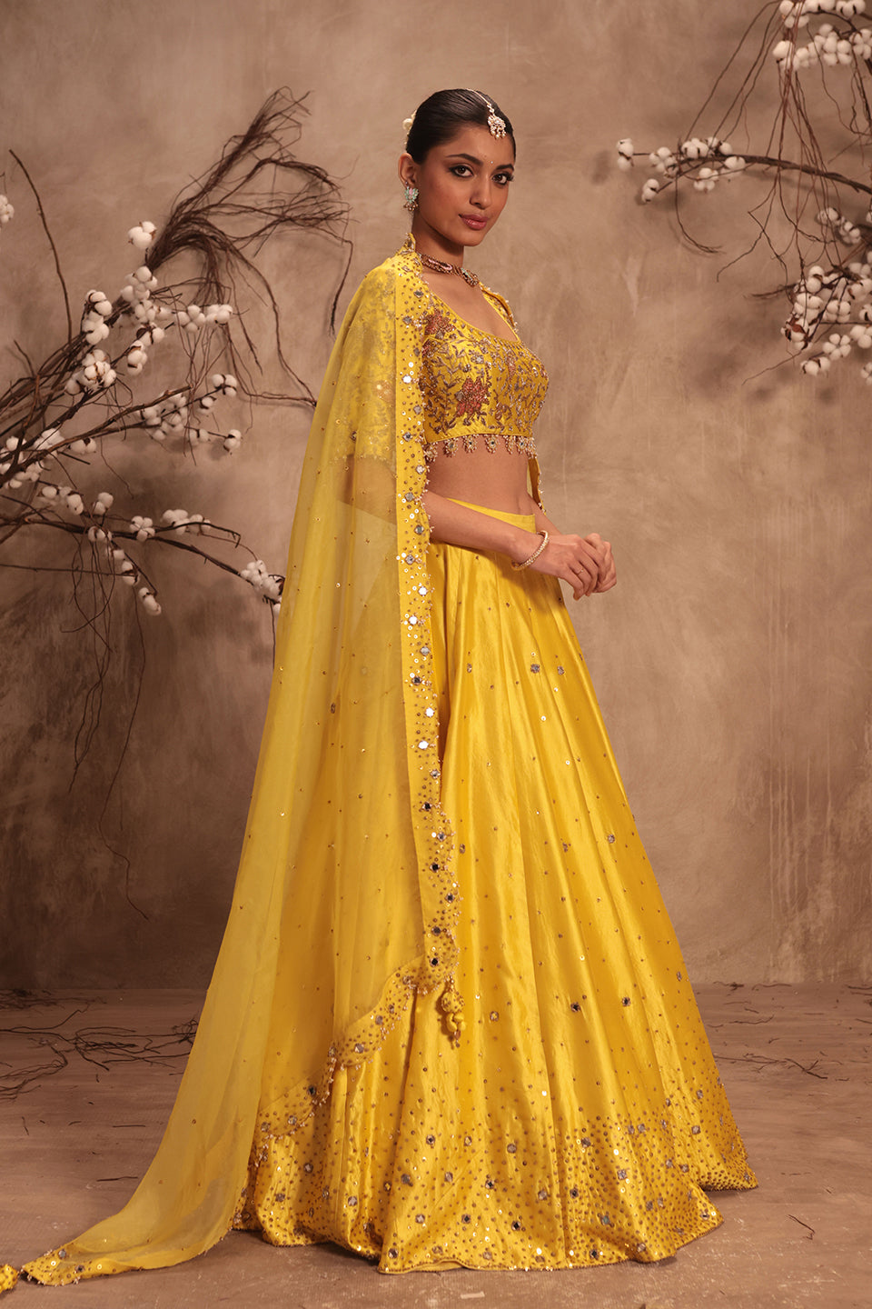 Nazakat Yellow Heavy Mirror work Lehenga Set